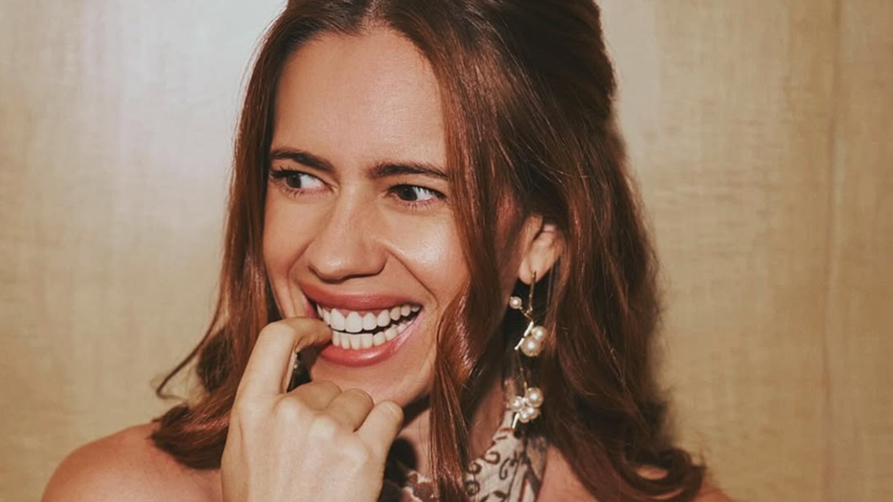 Actress Kalki Koechlin smiling warmly showcasing her natural laugh lines.
