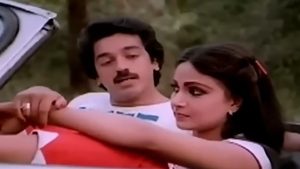 Kamal Haasan and Rati Agnihotri sharing a romantic scene in the 1985 film Dekha Pyar Tumhara